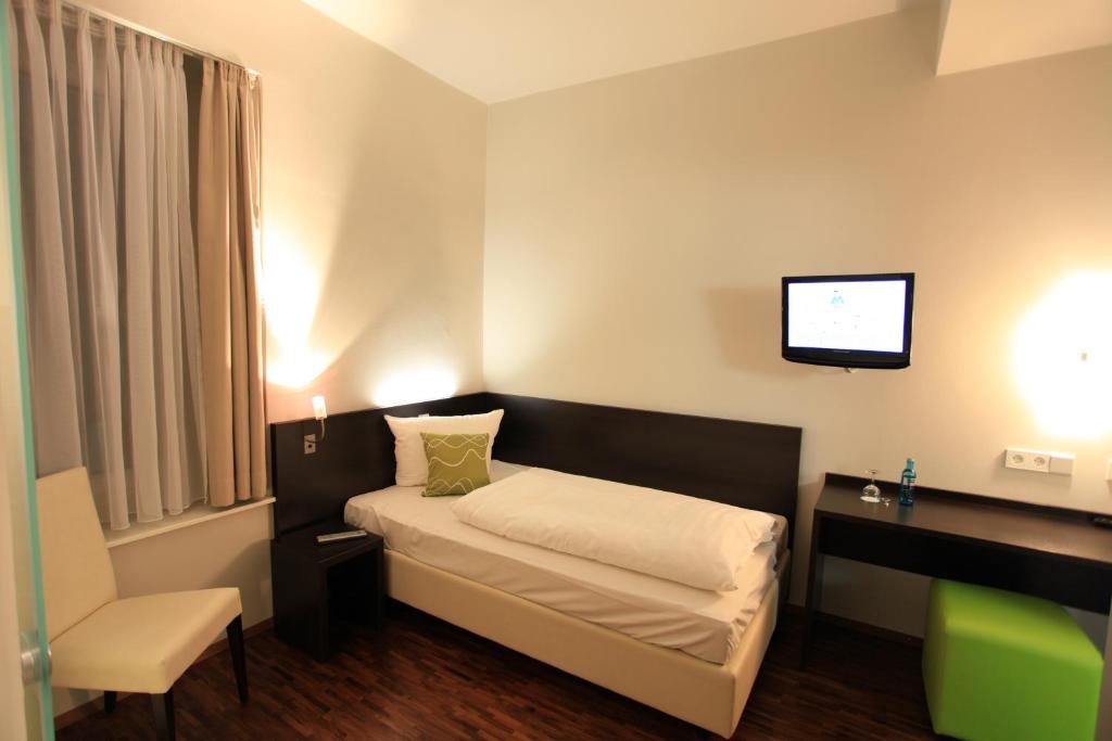 Postel nebo postele na pokoji v ubytování Art Hotel Lauterbach