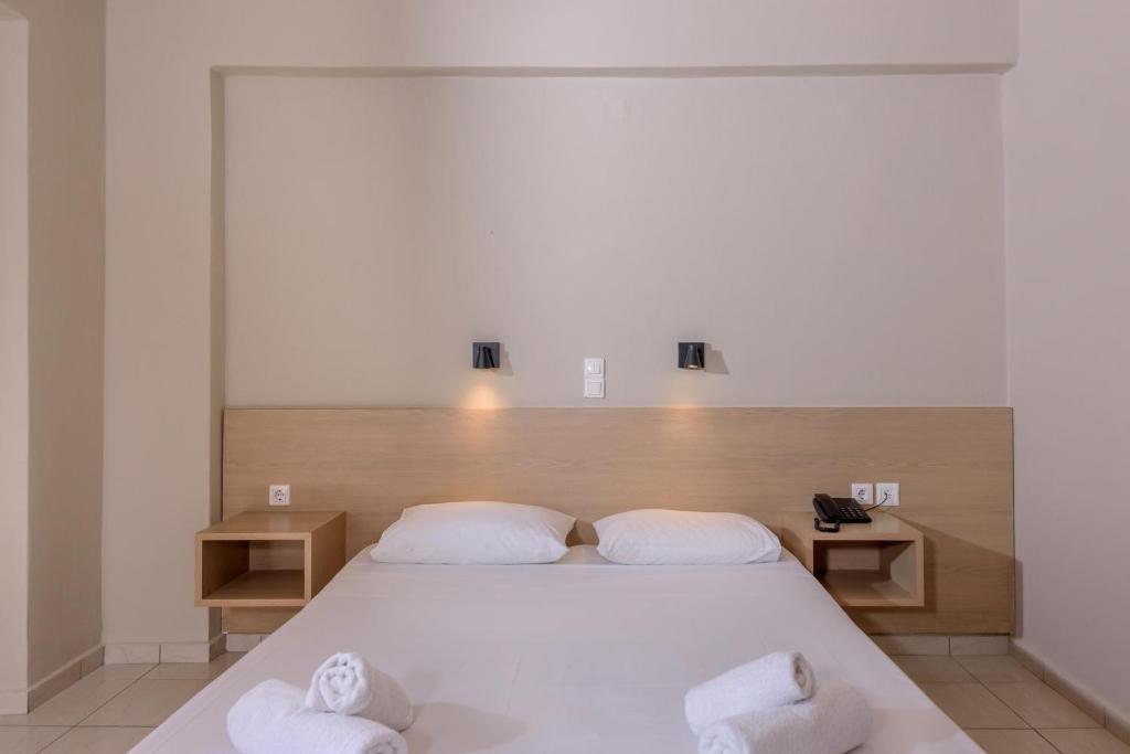 Postel nebo postele na pokoji v ubytování Zeus Hotels Ydoria Resort