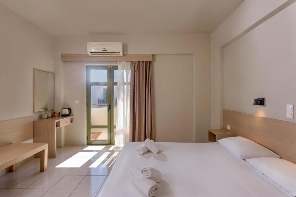 Postel nebo postele na pokoji v ubytování Zeus Hotels Ydoria Resort