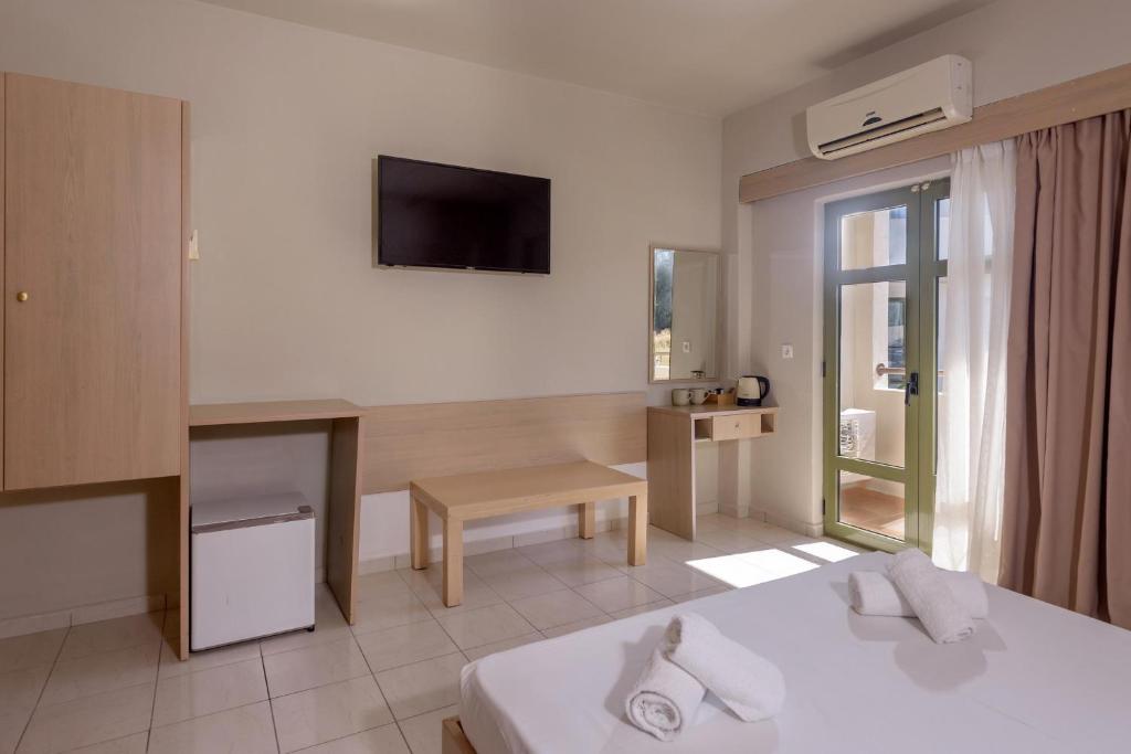 Postel nebo postele na pokoji v ubytování Zeus Hotels Ydoria Resort