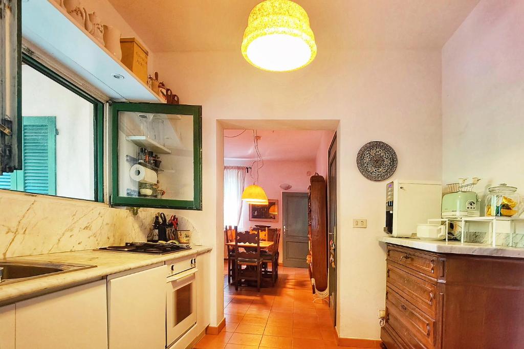 Kuchyň nebo kuchyňský kout v ubytování B&B Due Fiumi 1908