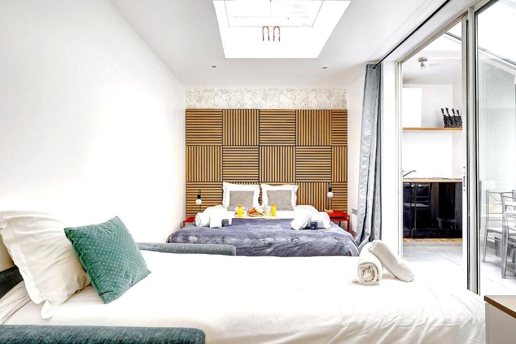 Posteľ alebo postele v izbe v ubytovaní 244 Suite Saint Dominique - Superb apartment