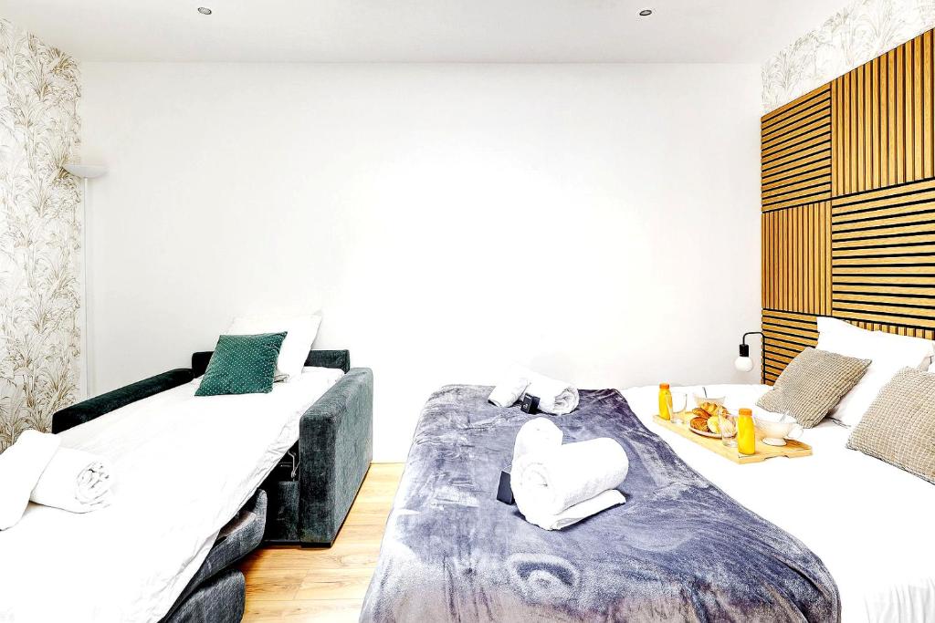 Posteľ alebo postele v izbe v ubytovaní 244 Suite Saint Dominique - Superb apartment