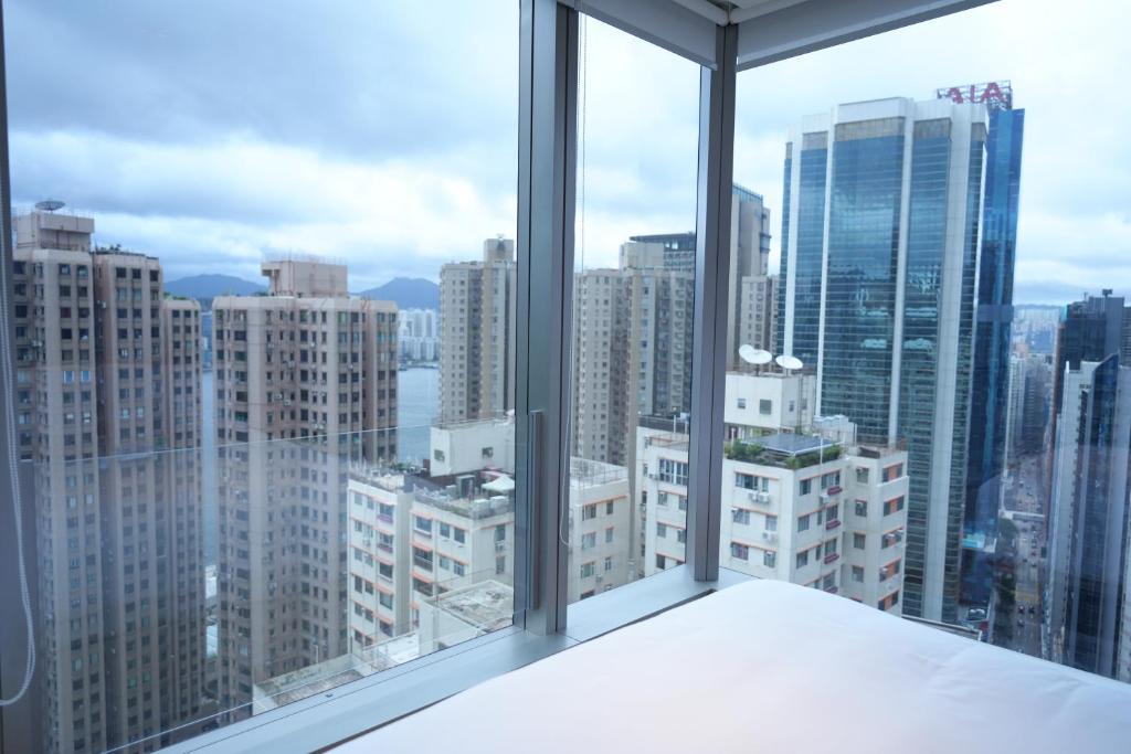 Nespecifikovaný výhled na destinaci Hongkong nebo výhled na město při pohledu z aparthotelu