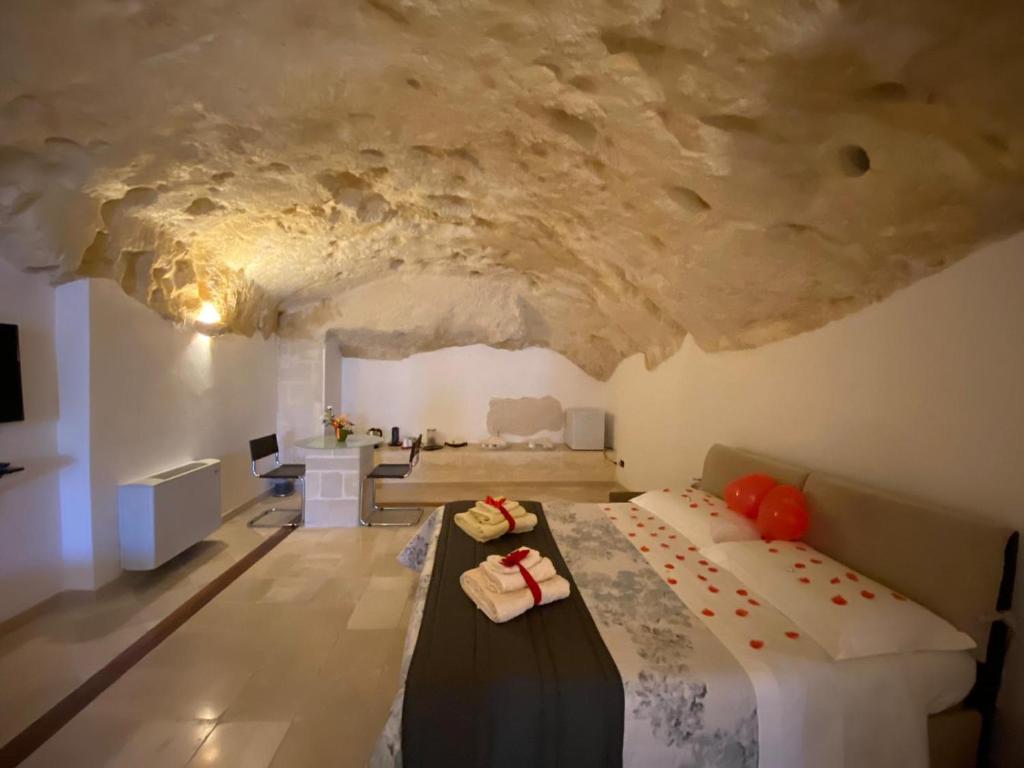 Postel nebo postele na pokoji v ubytování Alla dimora di Chiara Suite and Rooms