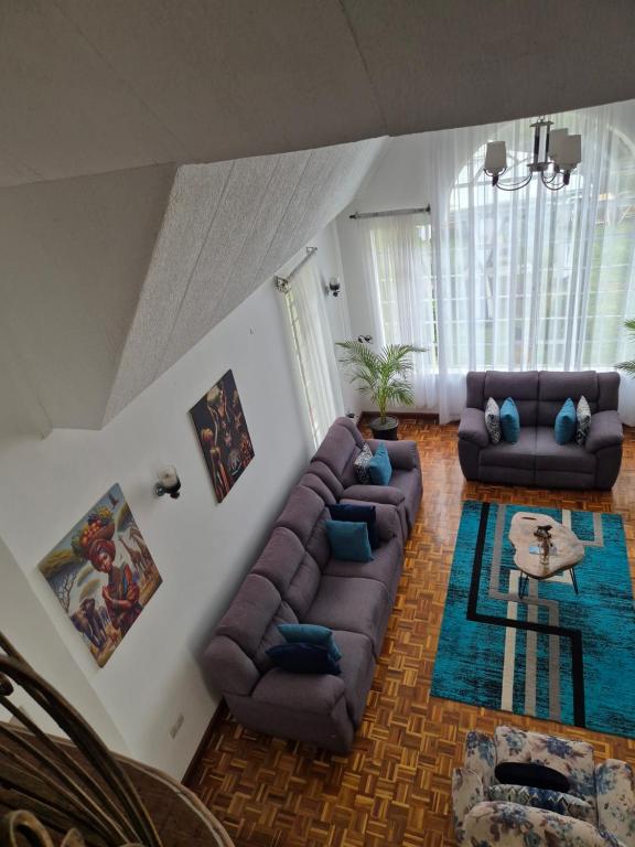 Posezení v ubytování Teresita Home JKIA
