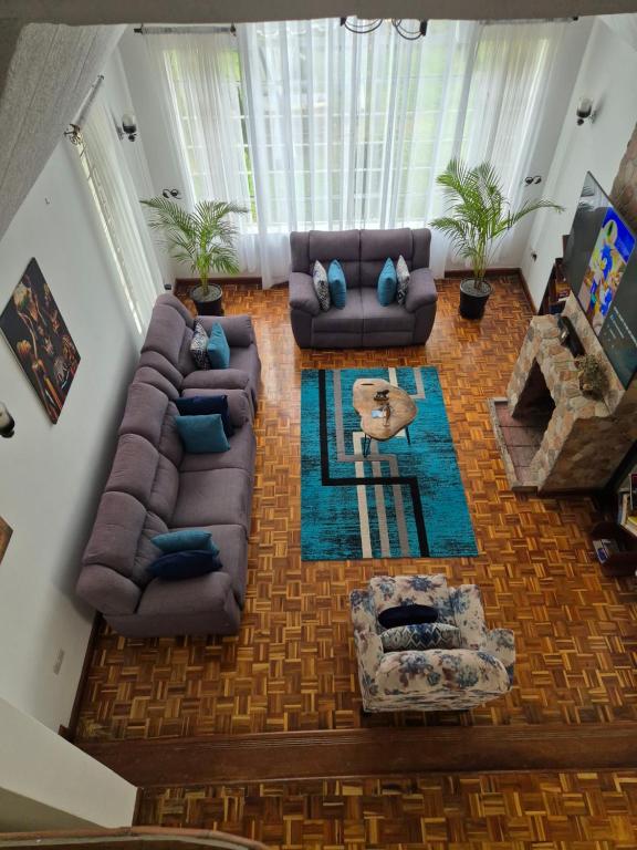 Posezení v ubytování Teresita Home JKIA