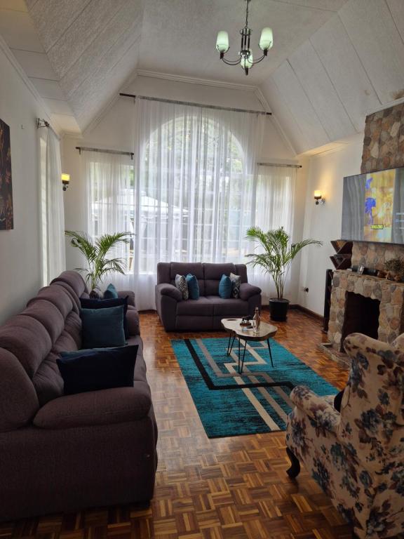 Posezení v ubytování Teresita Home JKIA