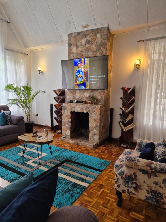 Posezení v ubytování Teresita Home JKIA