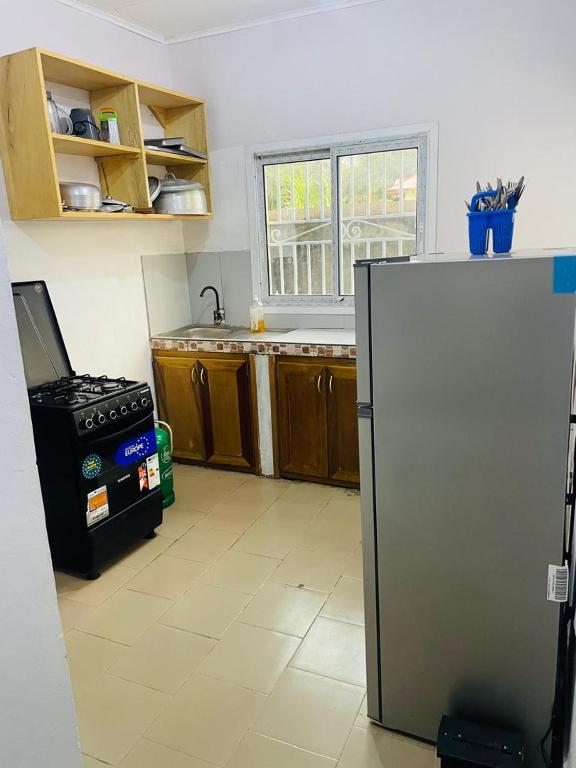 Kuchyň nebo kuchyňský kout v ubytování Hotel Résidences des Hotes