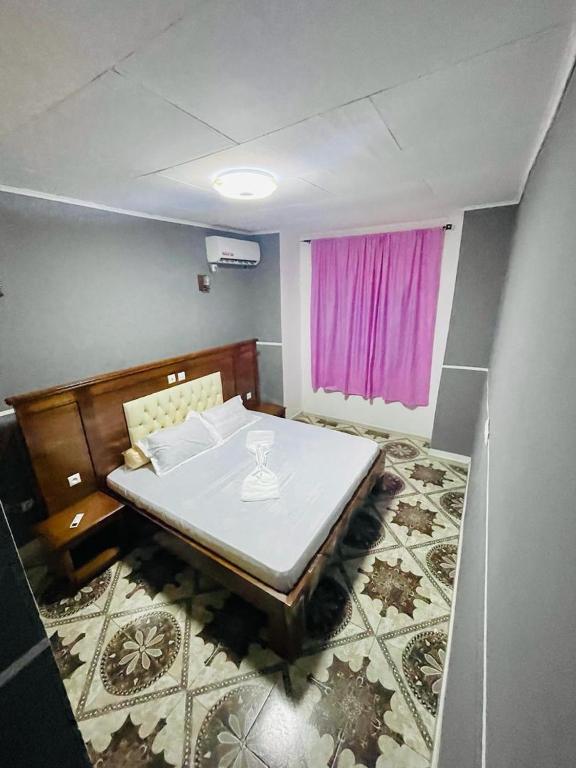 Postel nebo postele na pokoji v ubytování Hotel Résidences des Hotes
