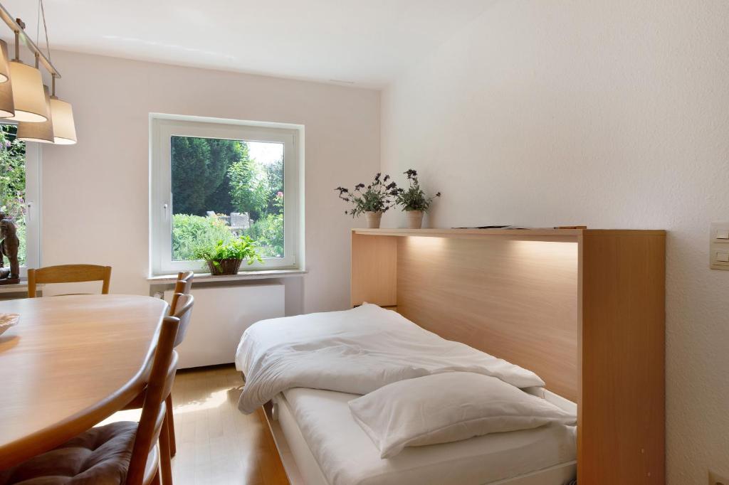 Postel nebo postele na pokoji v ubytování Ferienwohnung mit 100qm mit Garten