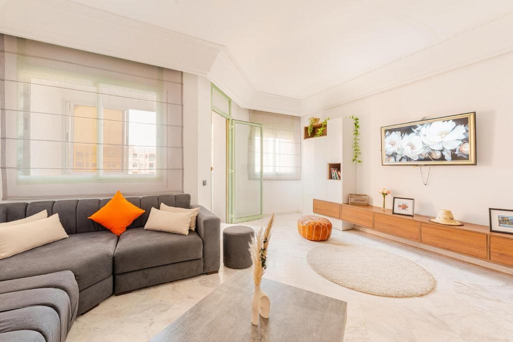 O zonă de relaxare la Confort et style en pleins centre de Hivernage