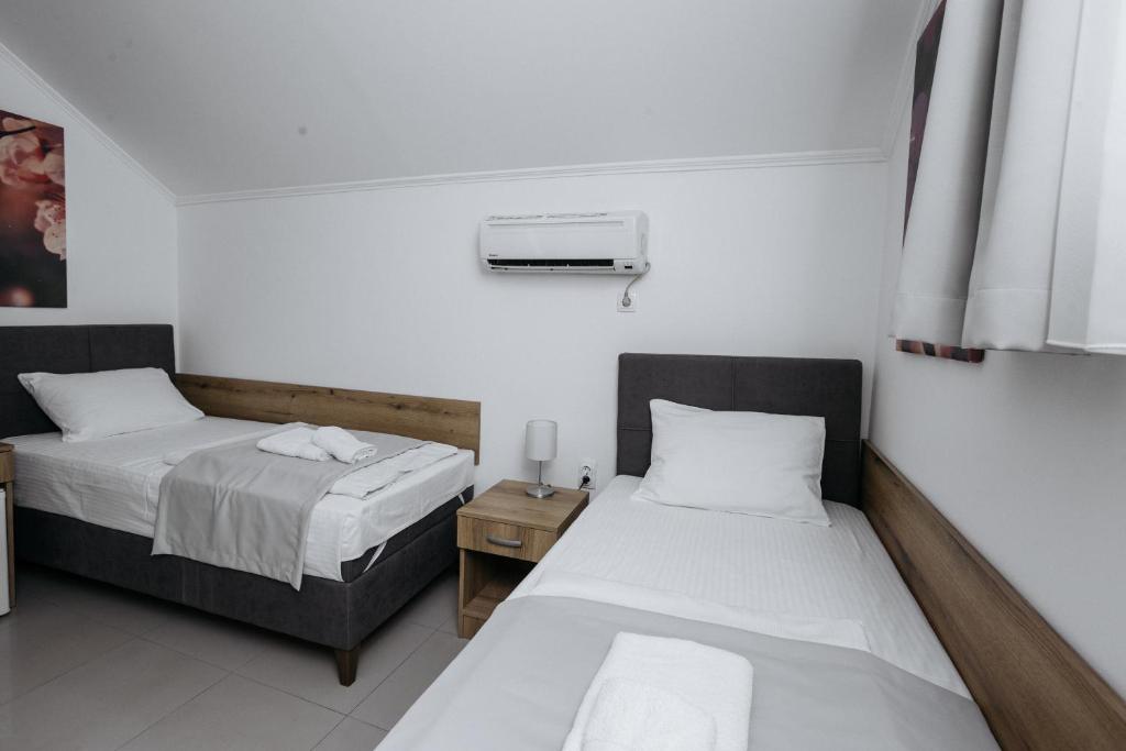 Postel nebo postele na pokoji v ubytování Rooms Gat