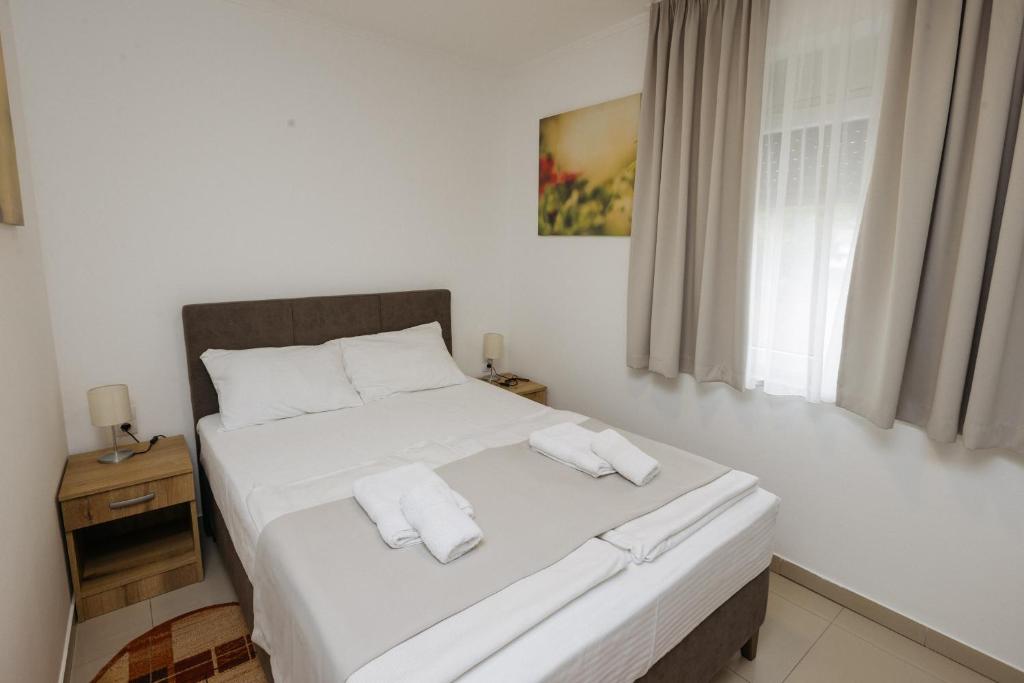 Postel nebo postele na pokoji v ubytování Rooms Gat