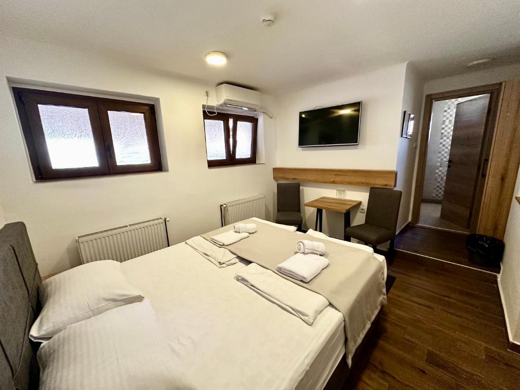 Postel nebo postele na pokoji v ubytování Rooms Gat