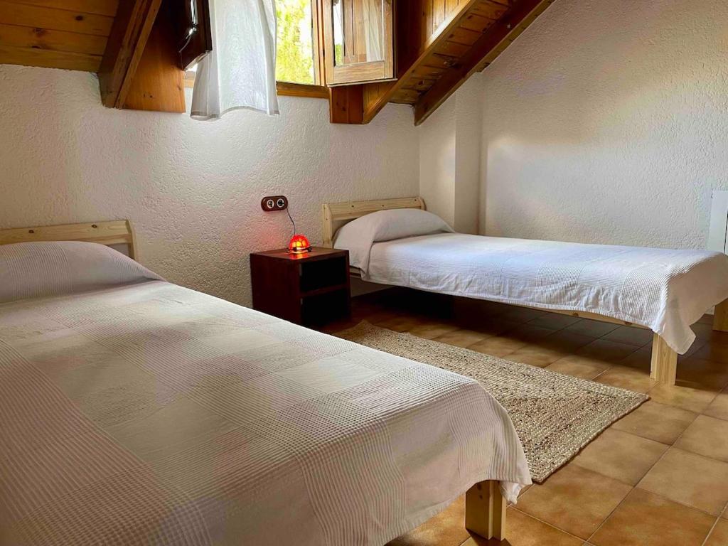 Ένα ή περισσότερα κρεβάτια σε δωμάτιο στο Casa Alexia