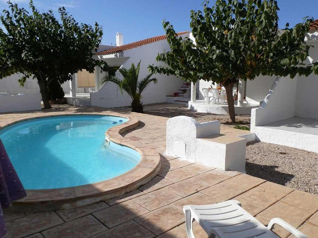 Bazén v ubytování Vacaciones junto al mar: piscina, aire acondicionado, mascotas bienvenidas, playa para perros, WiFi gratis - ES-184-13 nebo v jeho okolí