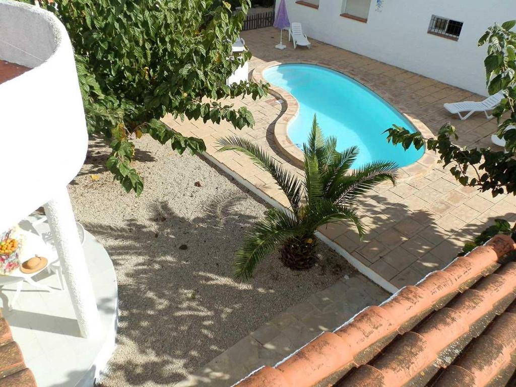 Bazén v ubytování Vacaciones junto al mar: piscina, aire acondicionado, mascotas bienvenidas, playa para perros, WiFi gratis - ES-184-13 nebo v jeho okolí