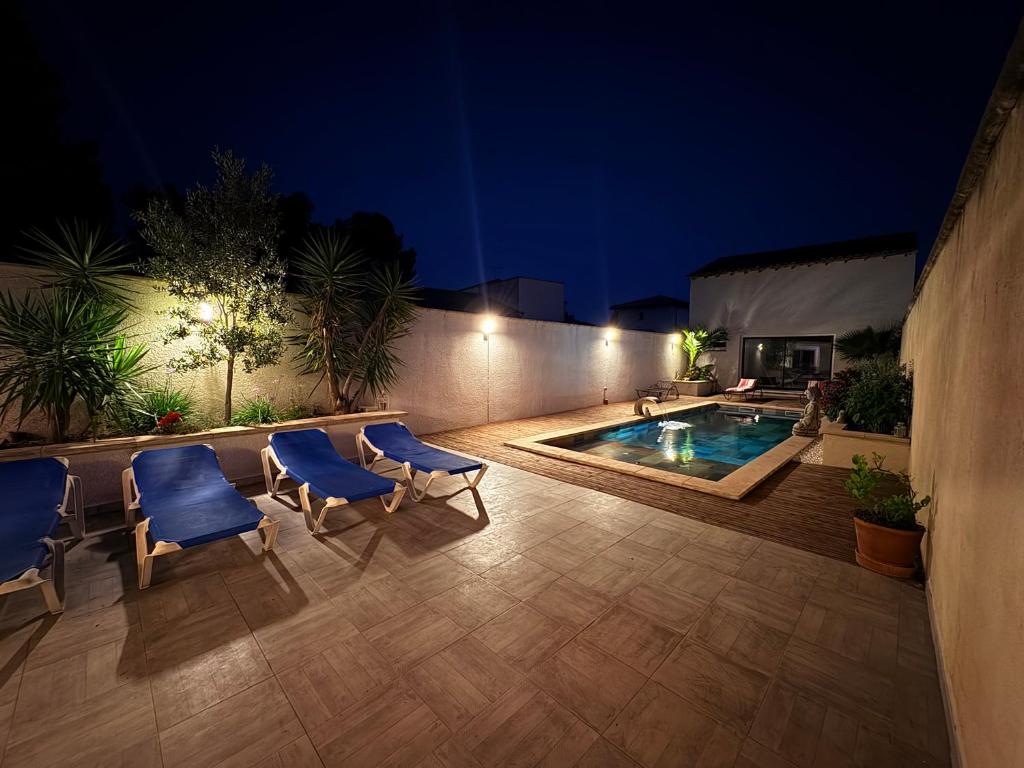 Πισίνα στο ή κοντά στο AMAIRADOU maison de vacances