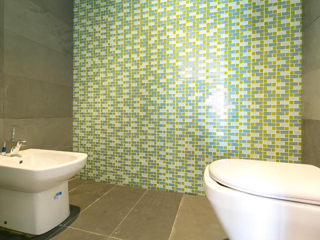 Kúpeľňa v ubytovaní CASA DIAZ PACHECO -Magnífica casa en Almadrava con piscina privada. - ES-228-93