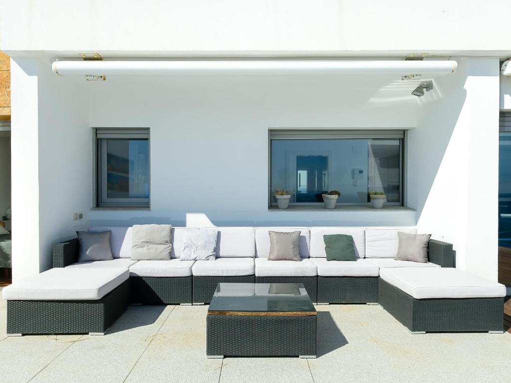 Posedenie v ubytovaní CASA DIAZ PACHECO -Magnífica casa en Almadrava con piscina privada. - ES-228-93