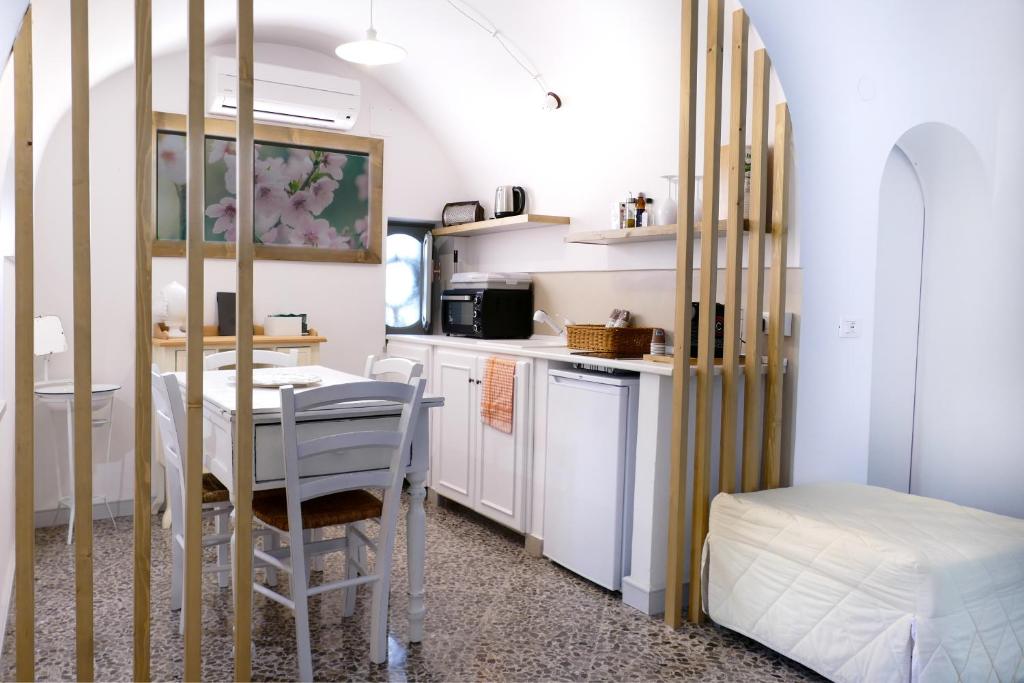 Kuchyň nebo kuchyňský kout v ubytování Trullo Porta Antica