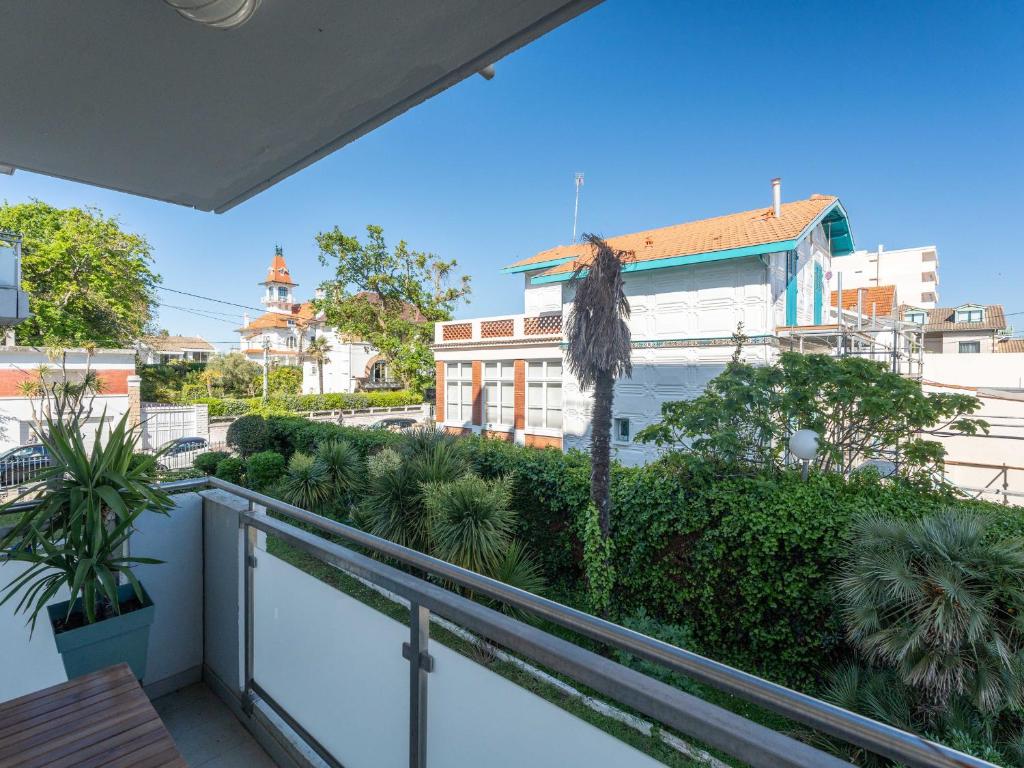 a balcony with a view of a city at Appartement Calme Proche Plage avec Parking Sécurisé et Balcon - Arcachon - FR-1-319-547 in Arcachon