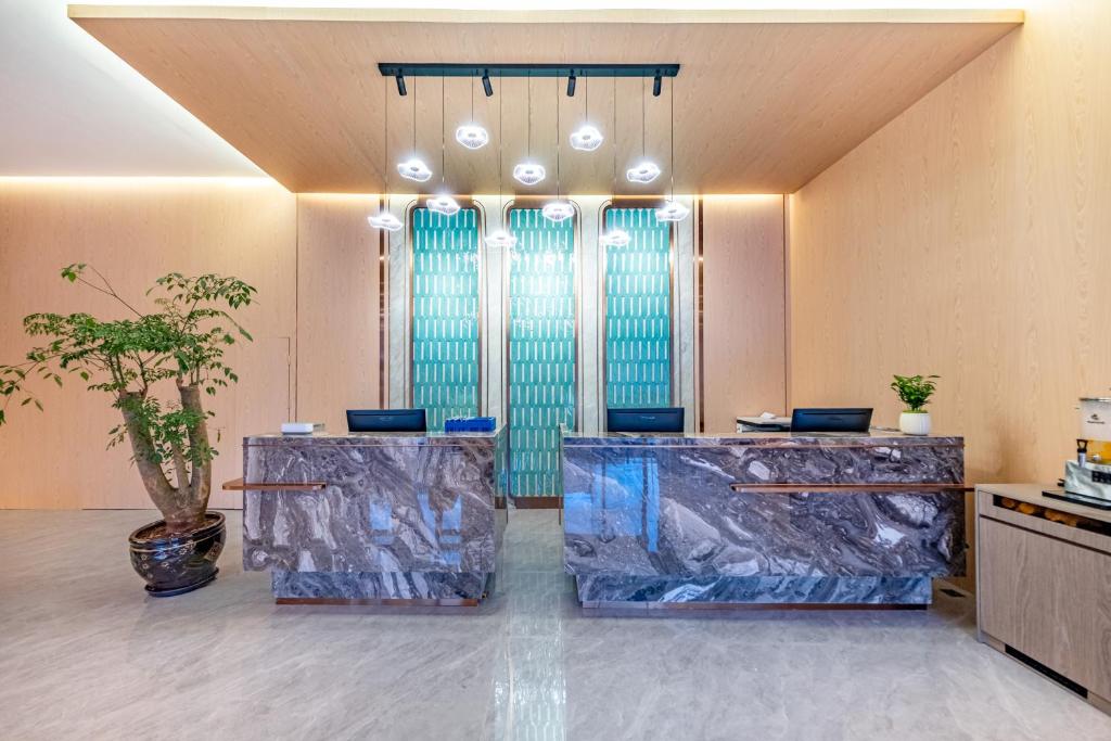 Vstupní hala nebo recepce v ubytování Kunming Meihao Lizhi Hotel Cuihu Park Yunnan University Hospital Branch