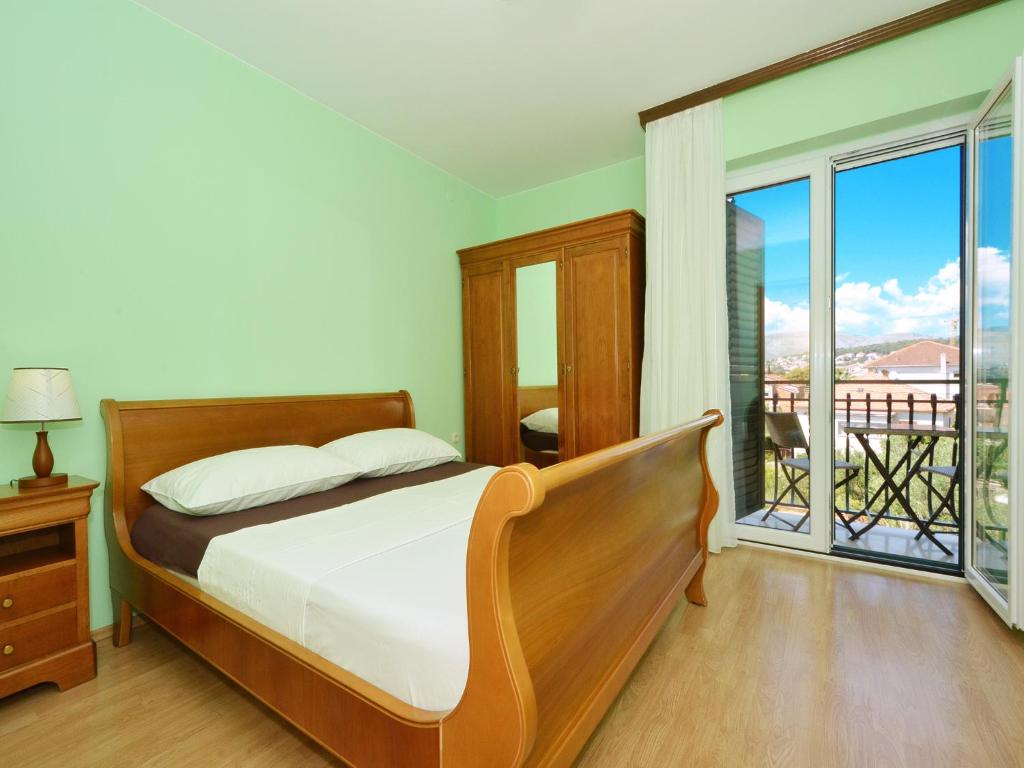 Postel nebo postele na pokoji v ubytování Apartment Vukadin