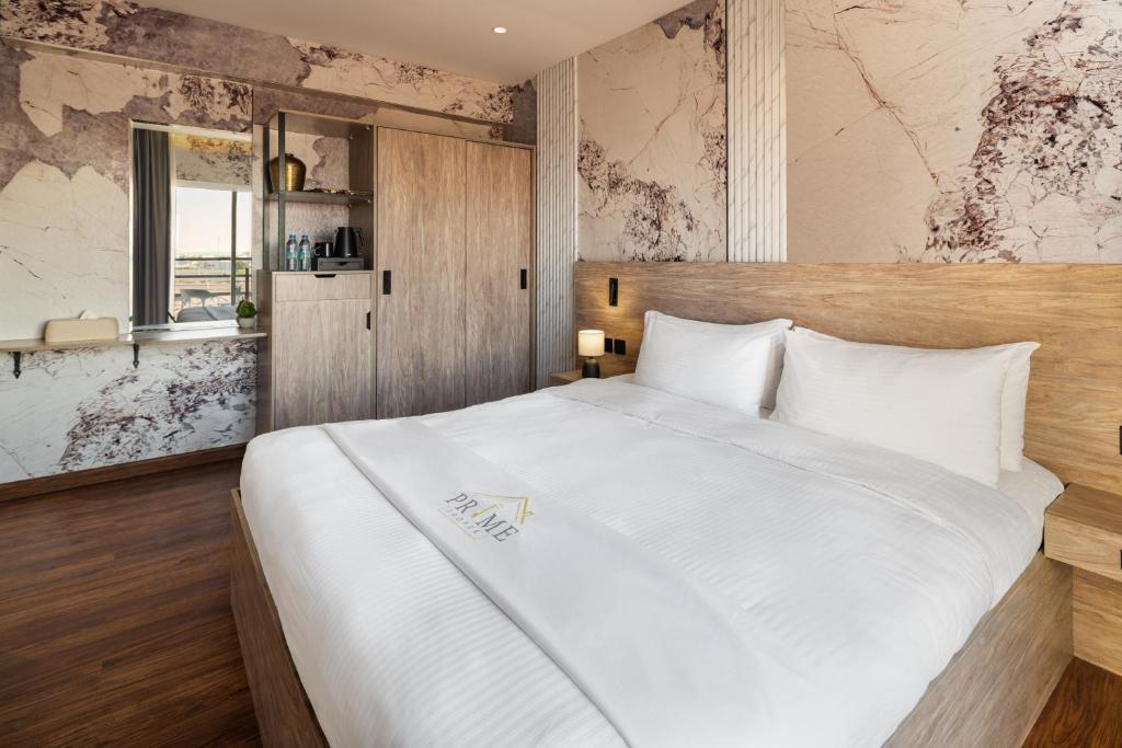 Postel nebo postele na pokoji v ubytování Regency Inn