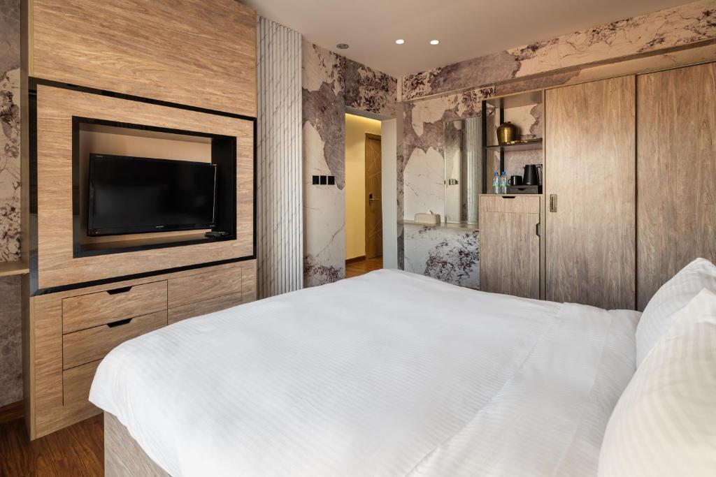 TV a/nebo společenská místnost v ubytování Regency Inn