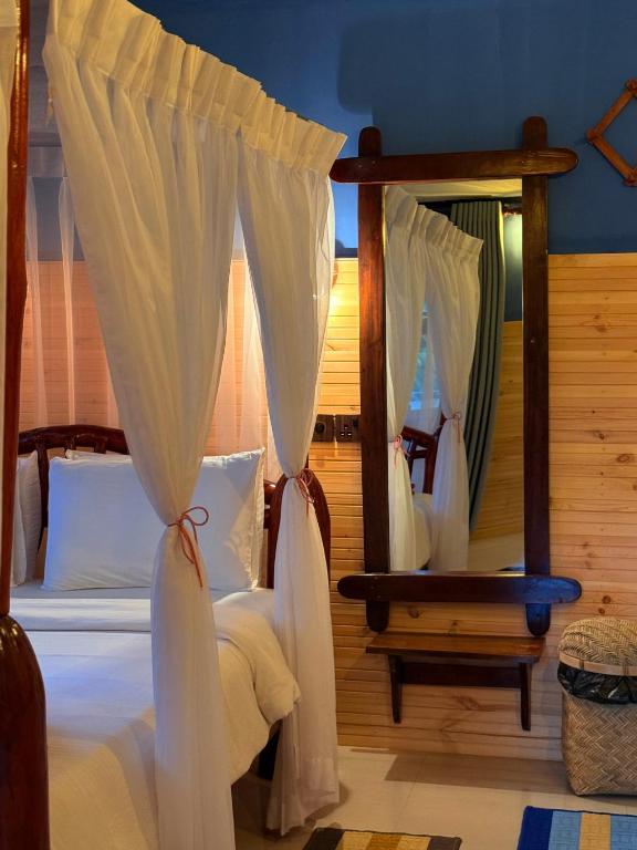 Postel nebo postele na pokoji v ubytování Guest Inn Avendra