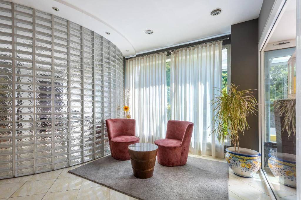 Posezení v ubytování Aston Hotel