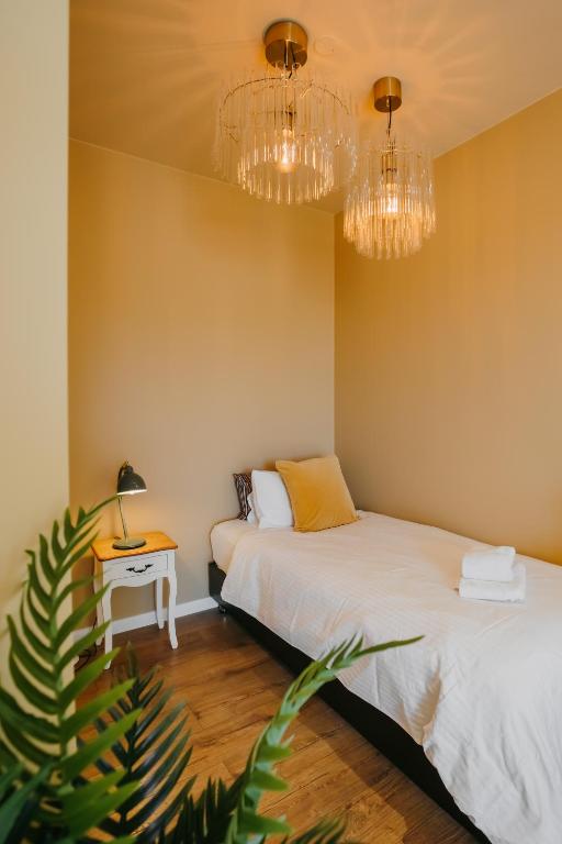 Postel nebo postele na pokoji v ubytování Guesthouse Fludir