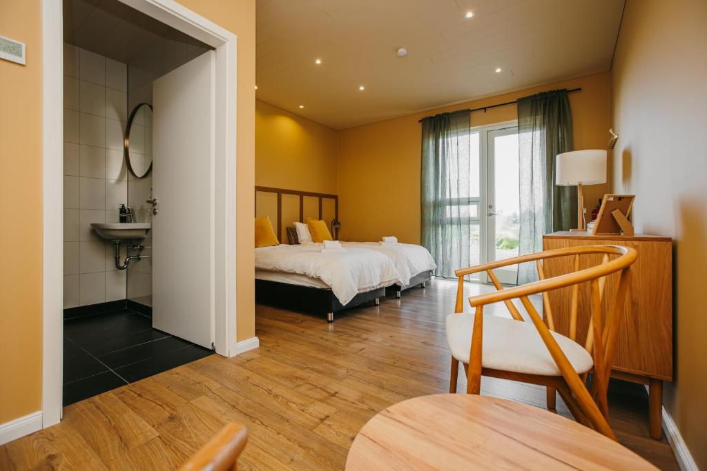Postel nebo postele na pokoji v ubytování Guesthouse Fludir