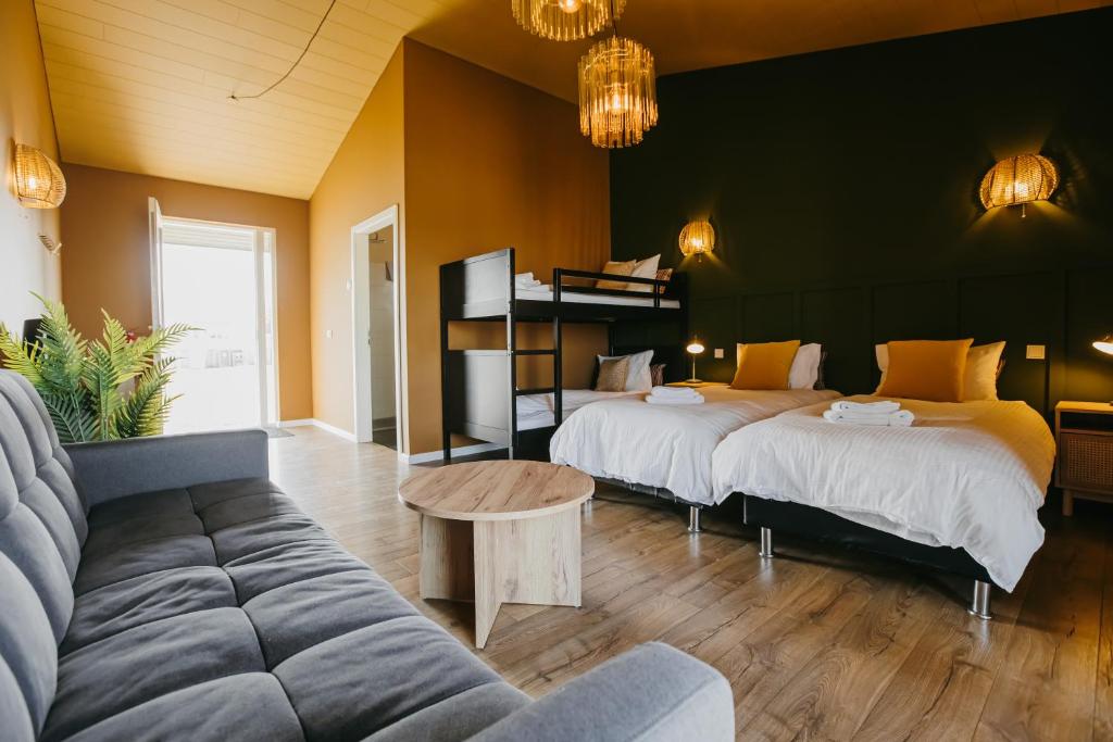 Postel nebo postele na pokoji v ubytování Guesthouse Fludir