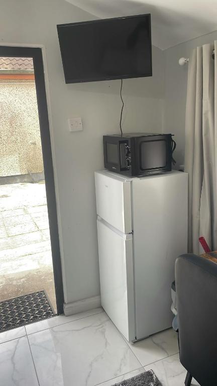Kuchyň nebo kuchyňský kout v ubytování Ardkeen-Outhouse