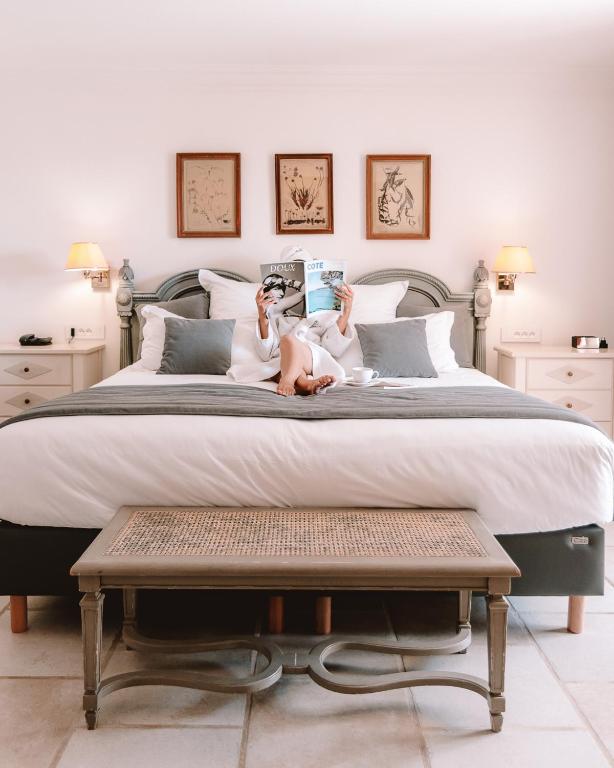 Postel nebo postele na pokoji v ubytování Le Phébus & Spa – Relais & Châteaux