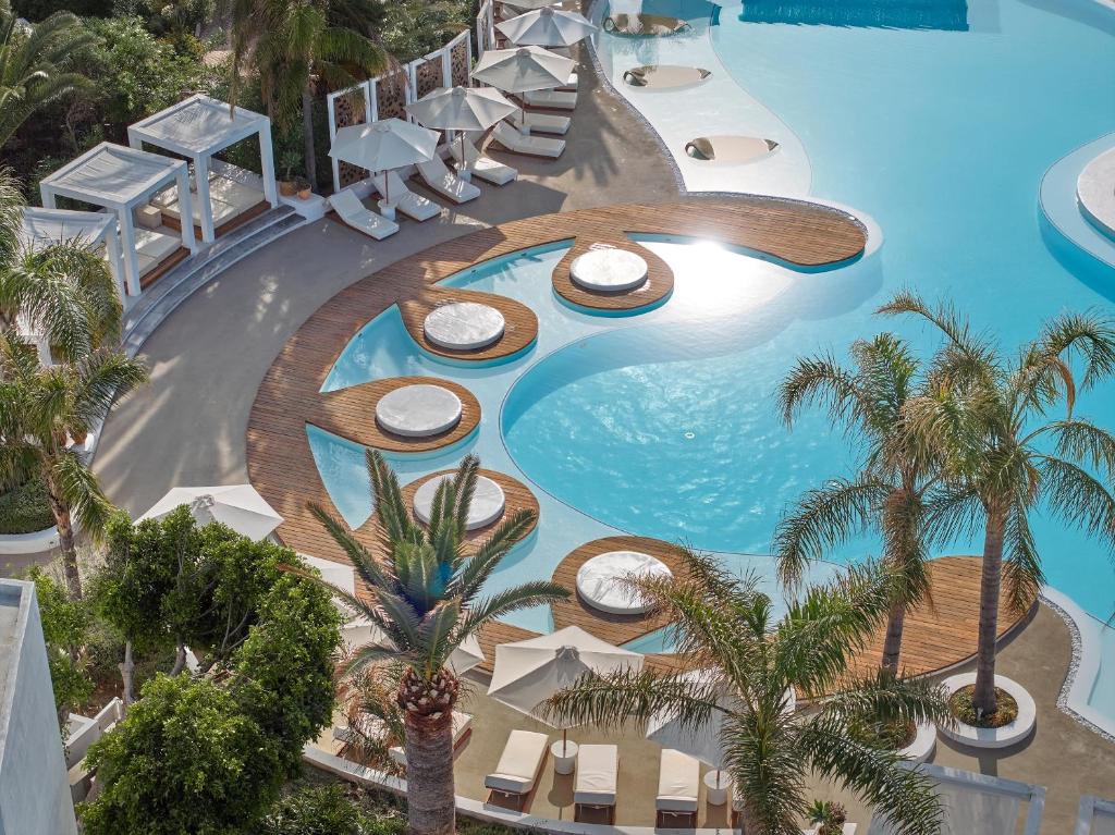 The swimming pool at or close to Caramel, A Grecotel Resort to Live