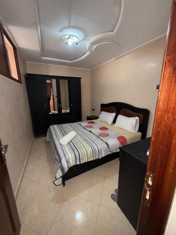 a bedroom with a bed in a room at Berber vibes in Tamraght Ouzdar