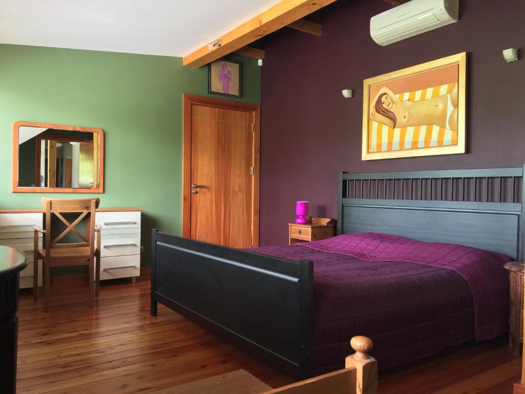 Postel nebo postele na pokoji v ubytování Ulinia Gardens