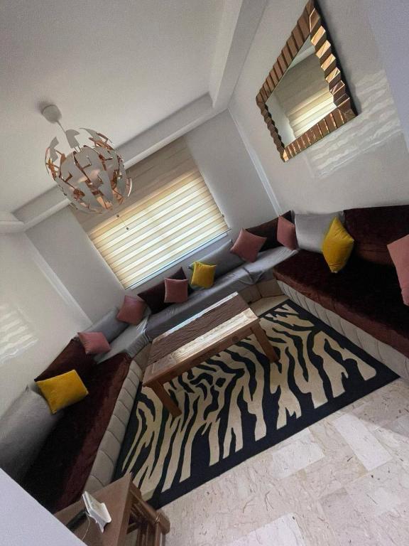 an overhead view of a living room with a zebra rug at Salam Beach in Pont Blondin