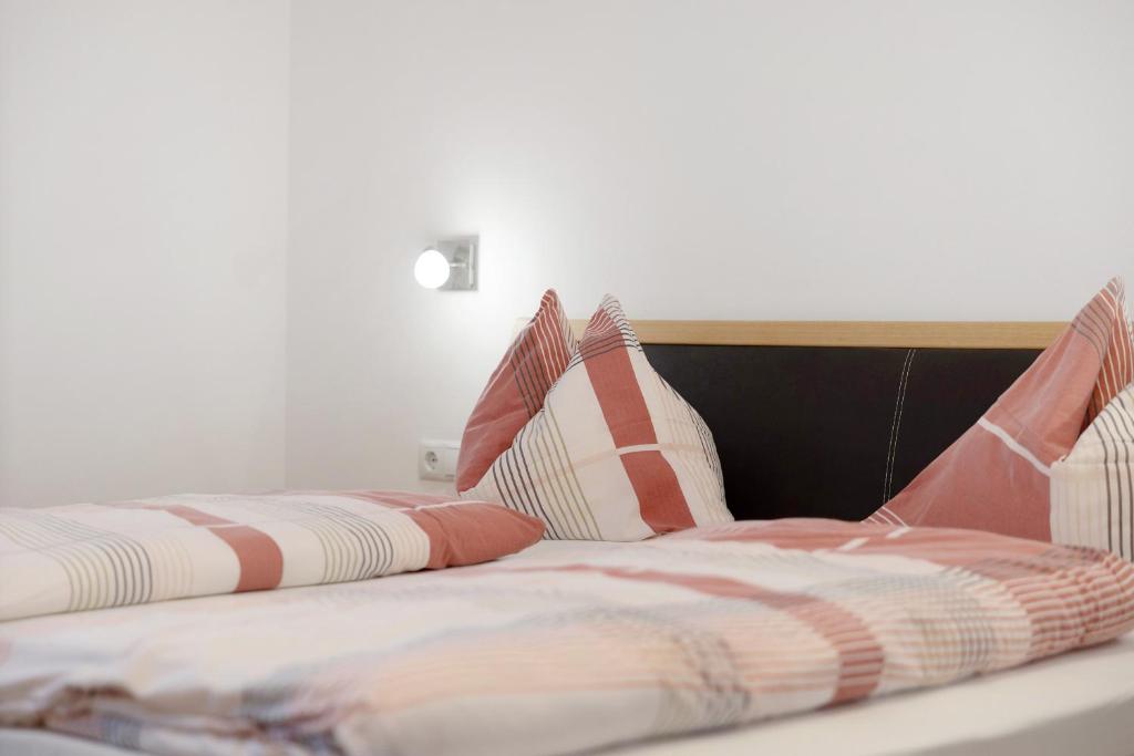 Postel nebo postele na pokoji v ubytování Moarhof