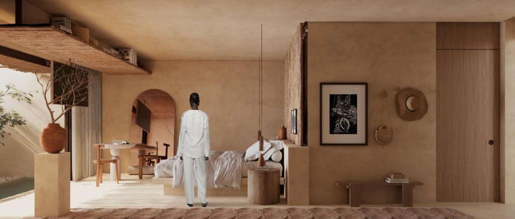 Voodi või voodid majutusasutuse Mana Hotel toas