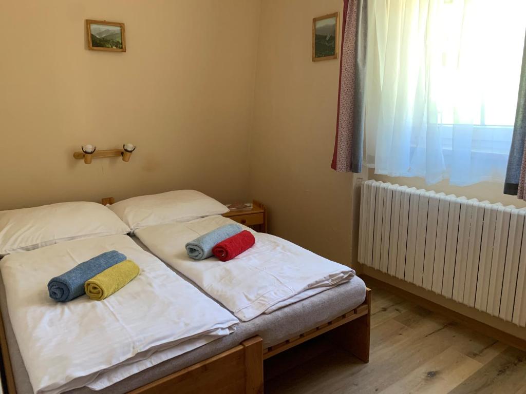 Postel nebo postele na pokoji v ubytování Pension U Pece