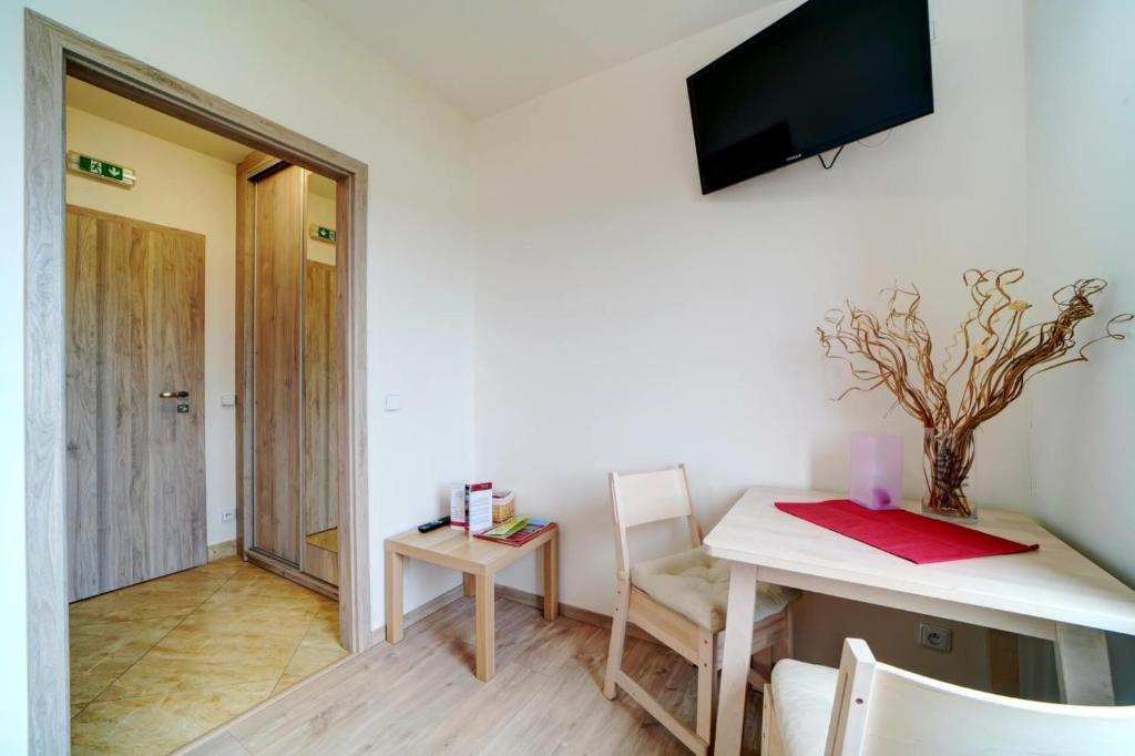TV a/nebo společenská místnost v ubytování Hotel Zlechov