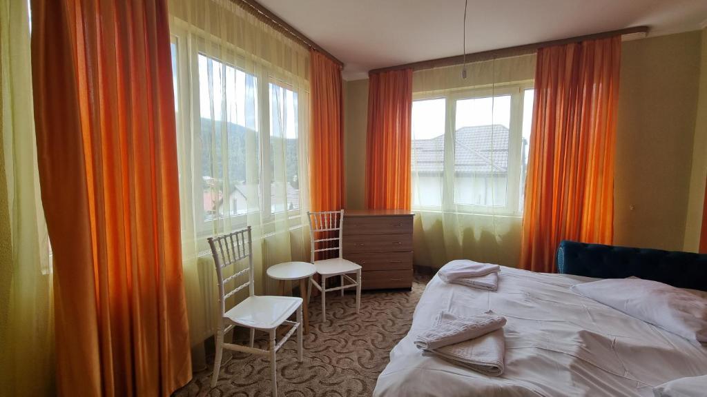 Postel nebo postele na pokoji v ubytování Hotel Iri