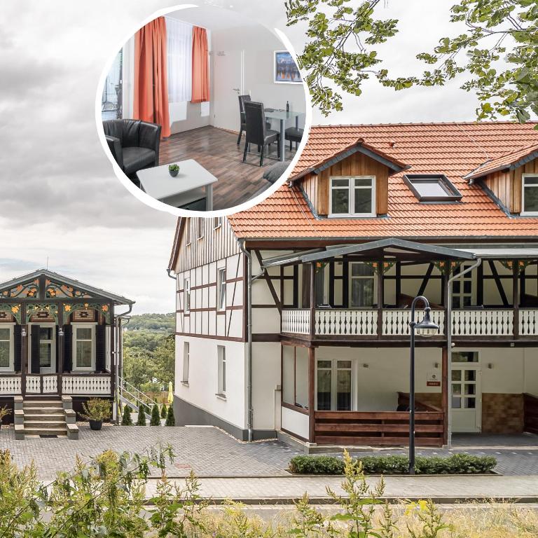 a house with a view of the outside of it at Le petit Palais - Apartments in Bad Suderode