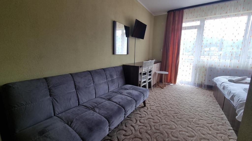 Postel nebo postele na pokoji v ubytování Hotel Iri